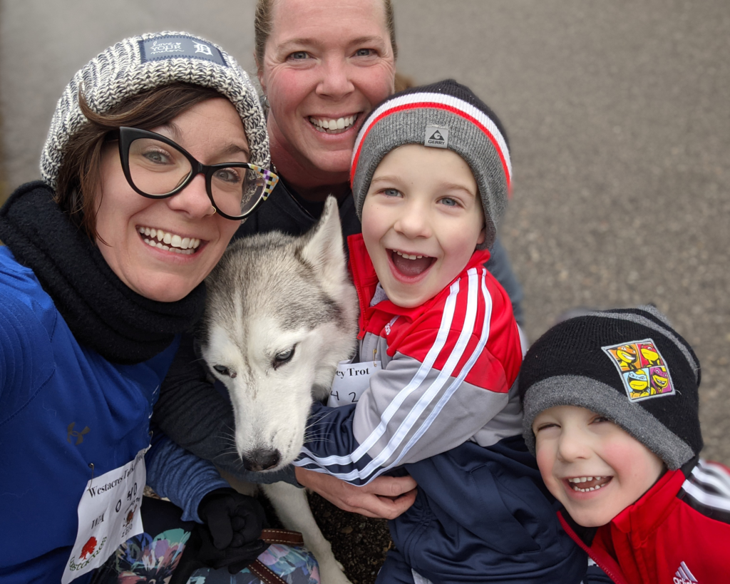 Melissa Brown with her wife, their two sons and their dog.